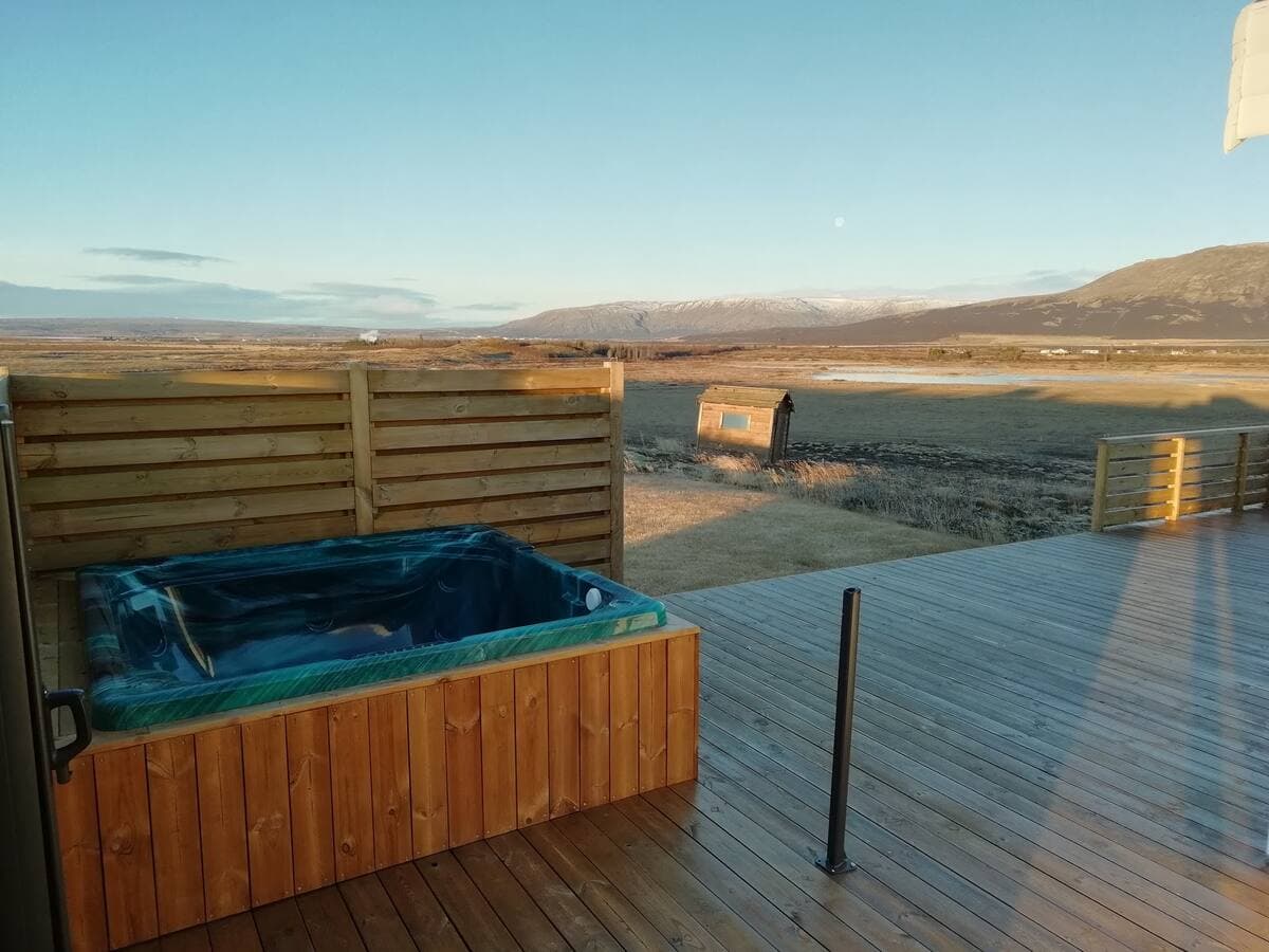 Hot tub on deck with mountain view