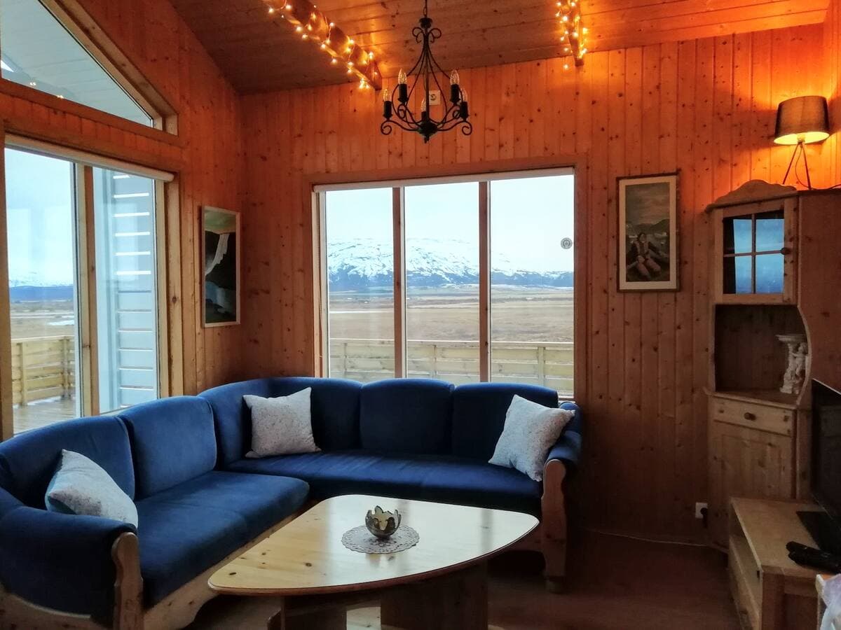 Living room interior with mountain window view